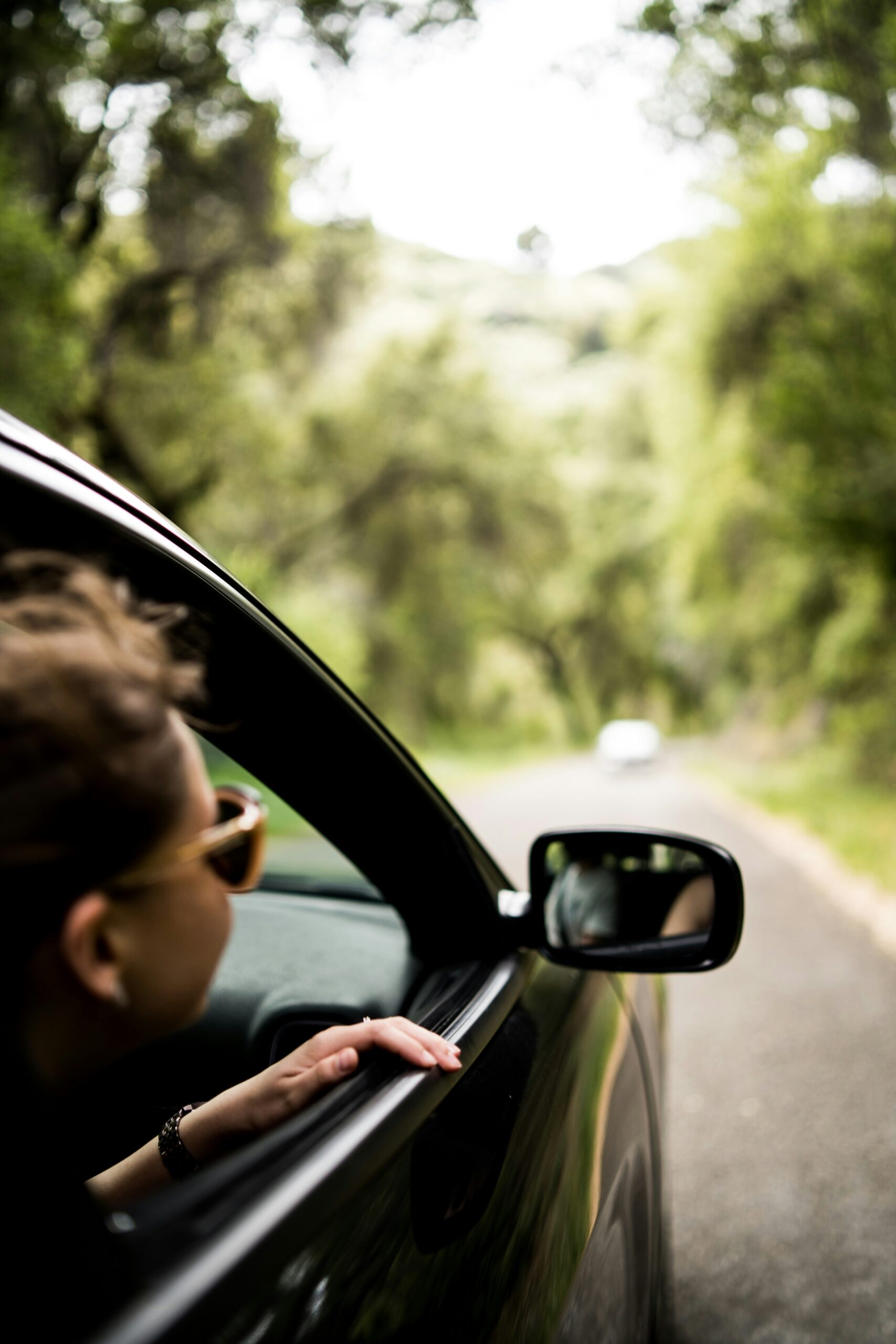Person looking out of a car window